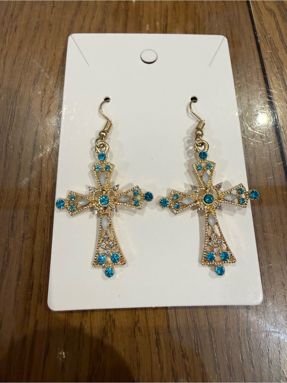 Gold Cross Drop Earrings with Blue Crystal Accents